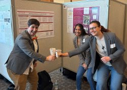 Gabriella Migliore, Asja Alic, and Ariel Bonneau Rodriguez celebrate a successful poster session at the Student Research Symposium