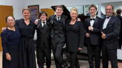 faculty with choir members from the math department