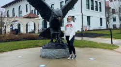 Hailee Lowry by the Red Hawk Statue