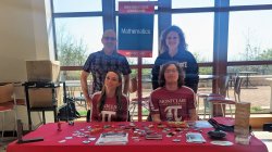 faculty and students at the math table in CELS for Accepted Students Day