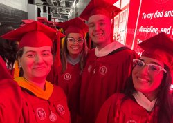 mathematics grads backstage before commencement