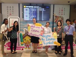 Welcome signs at airport for Lynka Tanaka