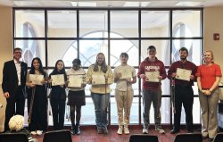 Photo of students being inducted into German Honor Society