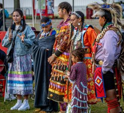 Indigenous people speaking to a crowd