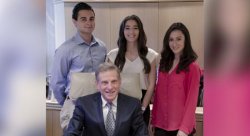 Photo of Rob Lieberman, All-Ways Advertising President, with interns and full-time employee Tiara Spano