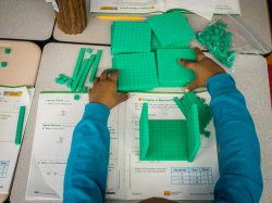 child working on math problem