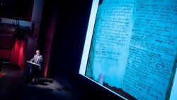 Jeffrey Alan Miller, associate professor of English at Montclair State University, lectures at a community event on his discovery of the earliest draft of the King James Bible