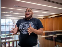 Jherel Saunders-Dittimus ‘20, the SGA president, records a greeting to students. Photo by Mike Peters.