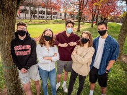 quints wearing masks on campus in fall