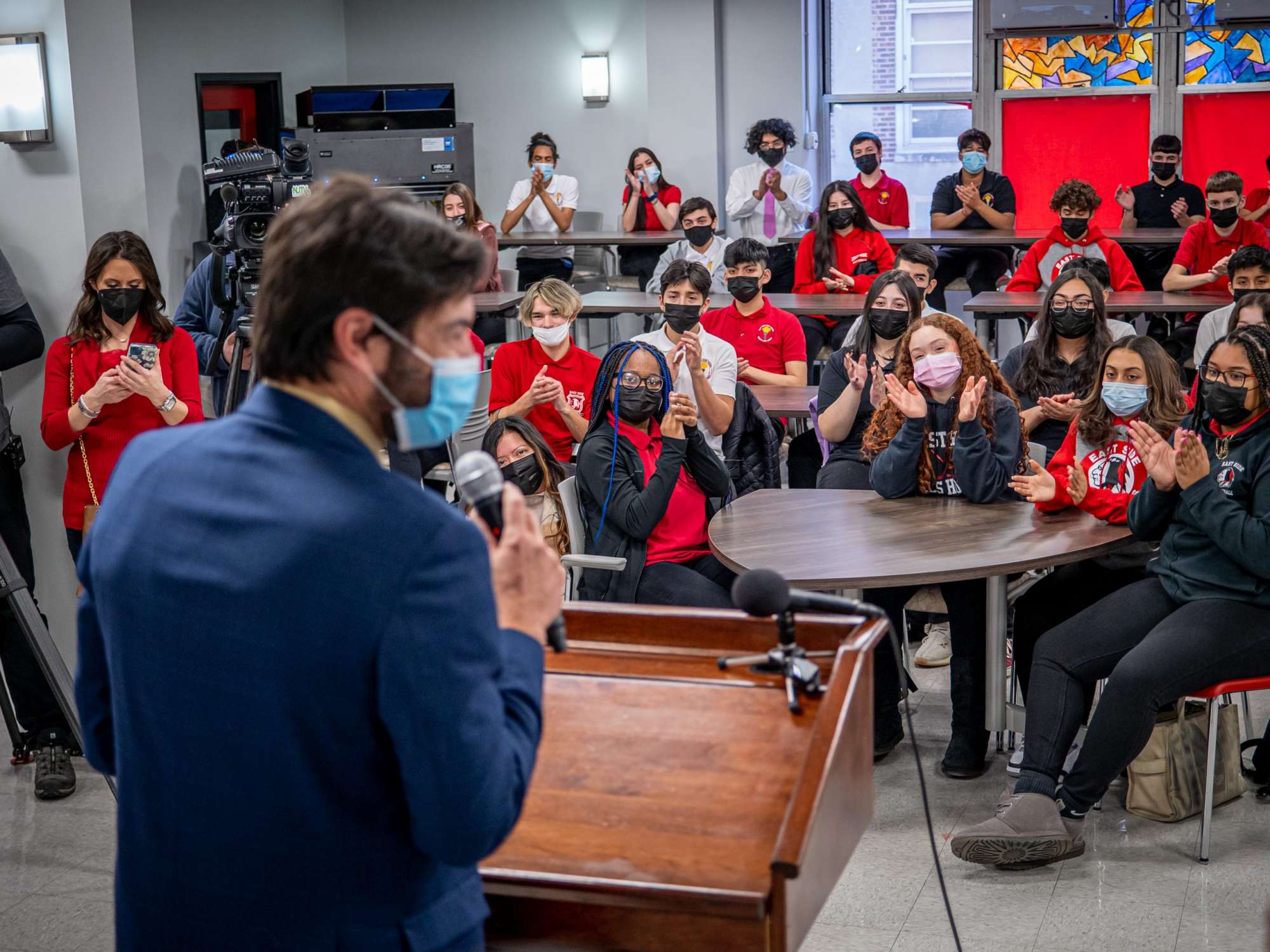 Montclair President Jonathan Koppell at podium in front of Teacher Academy students