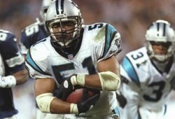 Photo of football player Sam Mills in action on the field