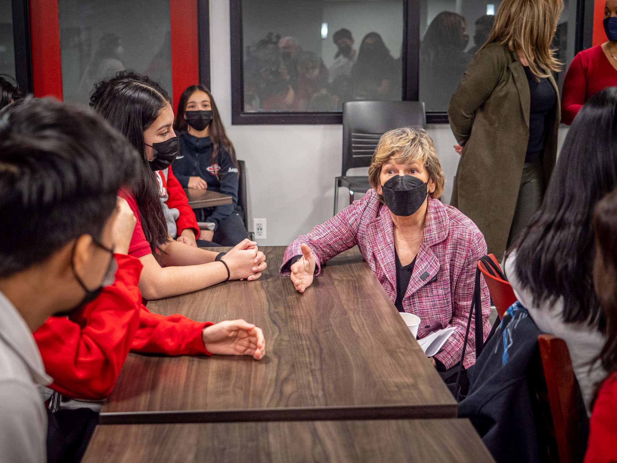 AFT President Randi Weingarten at a table with Teacher Academy students