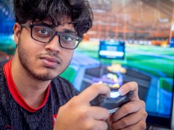 Vish Naik holding a game controller