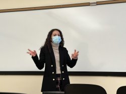 Isabella Paz Baldrich speaking in front of the classroom