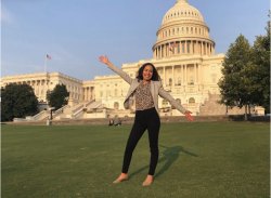 Photo of Isabella Paz Baldrich on the lawn in front of the US Congressional Building