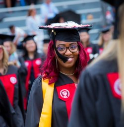 A Montclair State graduate in her mortarboard with tasel