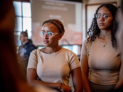 two students standing side by side