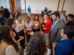 Group of students speaking with President Jonathan Koppell and Montclair Trustee Mary Comito