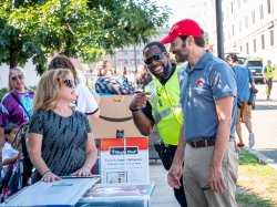 President Jonathan Koppell speaking with moving day staff