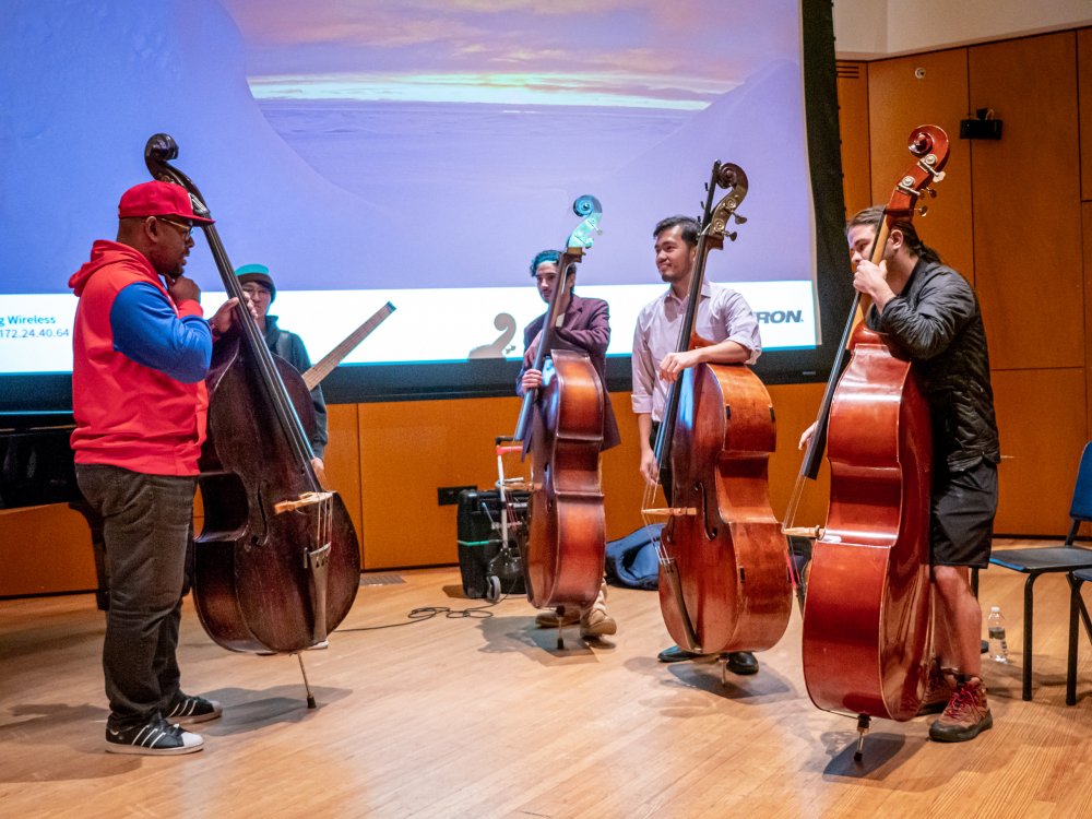 Christian McBride and students on stage