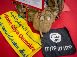 photo of folded banners and tactical backpack