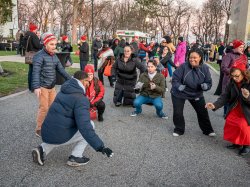 Group of people dancing on campus
