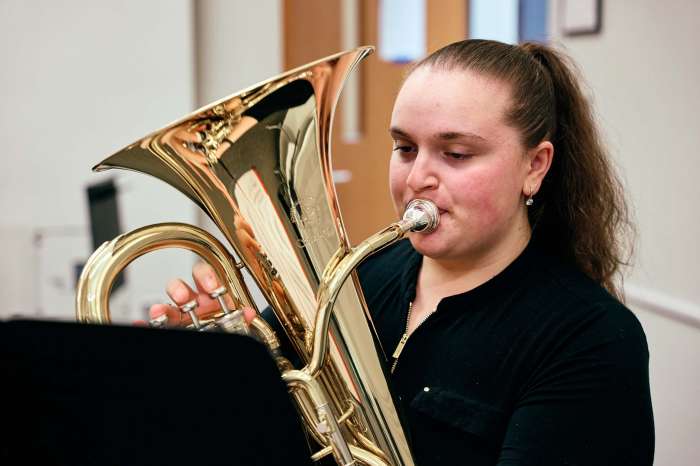 Female student playing the euphonium.