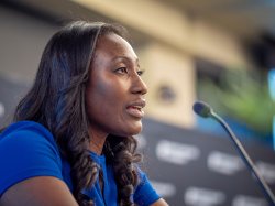 Elsie Alabi-Gonzalez speaking at a podium