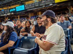 Spectators enjoy a game.