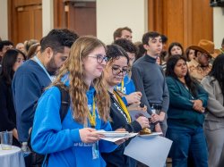 Students listen to a speaker during the 2024 Student Research Symposium.