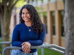 Angela Castro poses on Montclair State University campus.