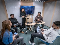 Olga Mikutina meets for a study session with four students.