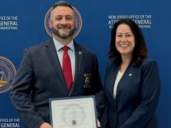 Chief Timothy Fox and NJ Attorney General Jennifer Davenport pose for a photo