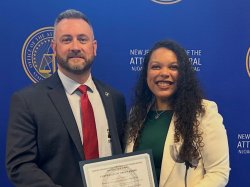 Chief Timothy Fox and Tisheka Allen pose for a photo