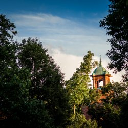 Photo of belltower atop College Hall.