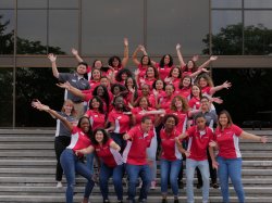 The Orientation Leaders posing for a photo on the front steps of the Student Center