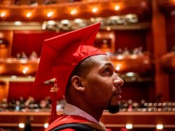 Graduate student at commencement.