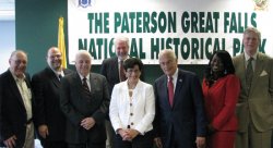 President Susan A. Cole (center) and Rep. Bill Pascrell with members of the Great Falls National Historical Park advisory commission. Pictured from left are, Pasquale Di Ianni, Robert Guarasci, Thomas Rooney, Bill Bolger, Cole, Pascrell, Karen Brown, and Leonard Zax.