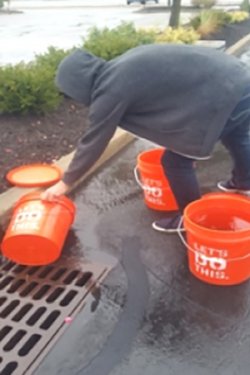 collecting stormwater in buckets