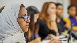 Students in class with tight focus