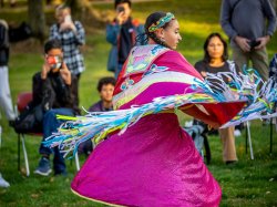 Red Blanket Singers member participating in tribal dance