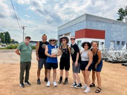 a group on the NAIS Summer trip to Wisconsin poses outside