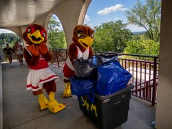 Rocky and Roxy helping students move in