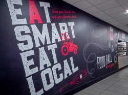 Large Graphic Text wall reads eat smart eat local