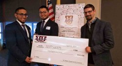 students and mentor with third place prize from UPitchNJ Competition