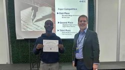 Elijah Abban Baidoo with his certificate for his second place paper award at the IEEE Region 1 and 2 SAC