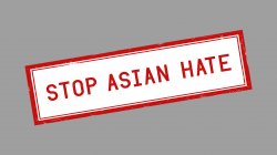 Stop Asian Hate with red grunge rubber stamp.