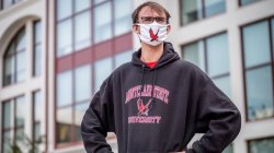 Student with Montclair mask and sweatshirt on.