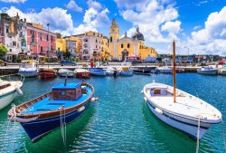 Photo of the boats and colorful buildings on the island of Campania, Italy.