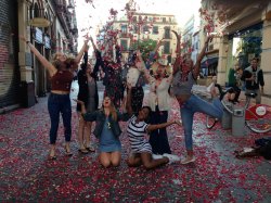 Dance students throwing rose petals in Sevilla